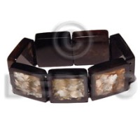 Elastic resin laminated one- sided